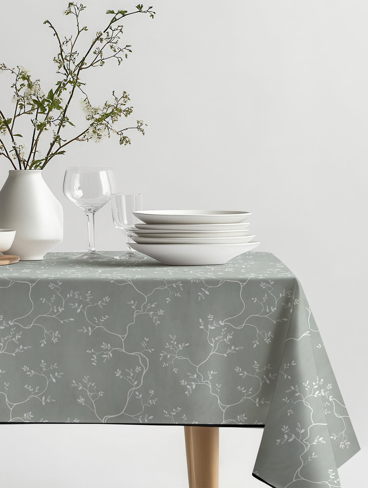 Mantel de hule Branche Verte sobre una mesa
