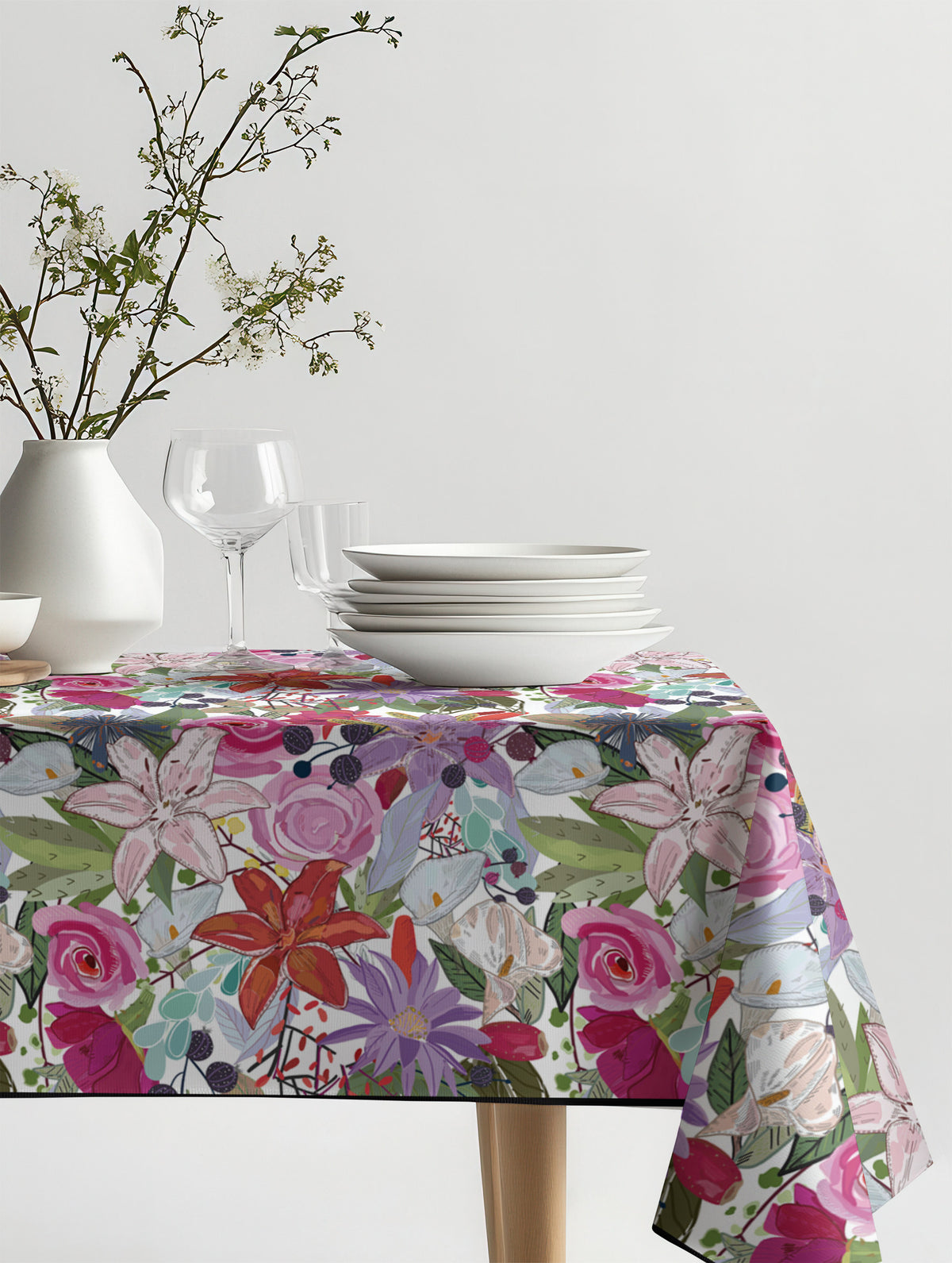 Mantel de hule Lily and Colorful Flowers Pattern sobre una mesa
