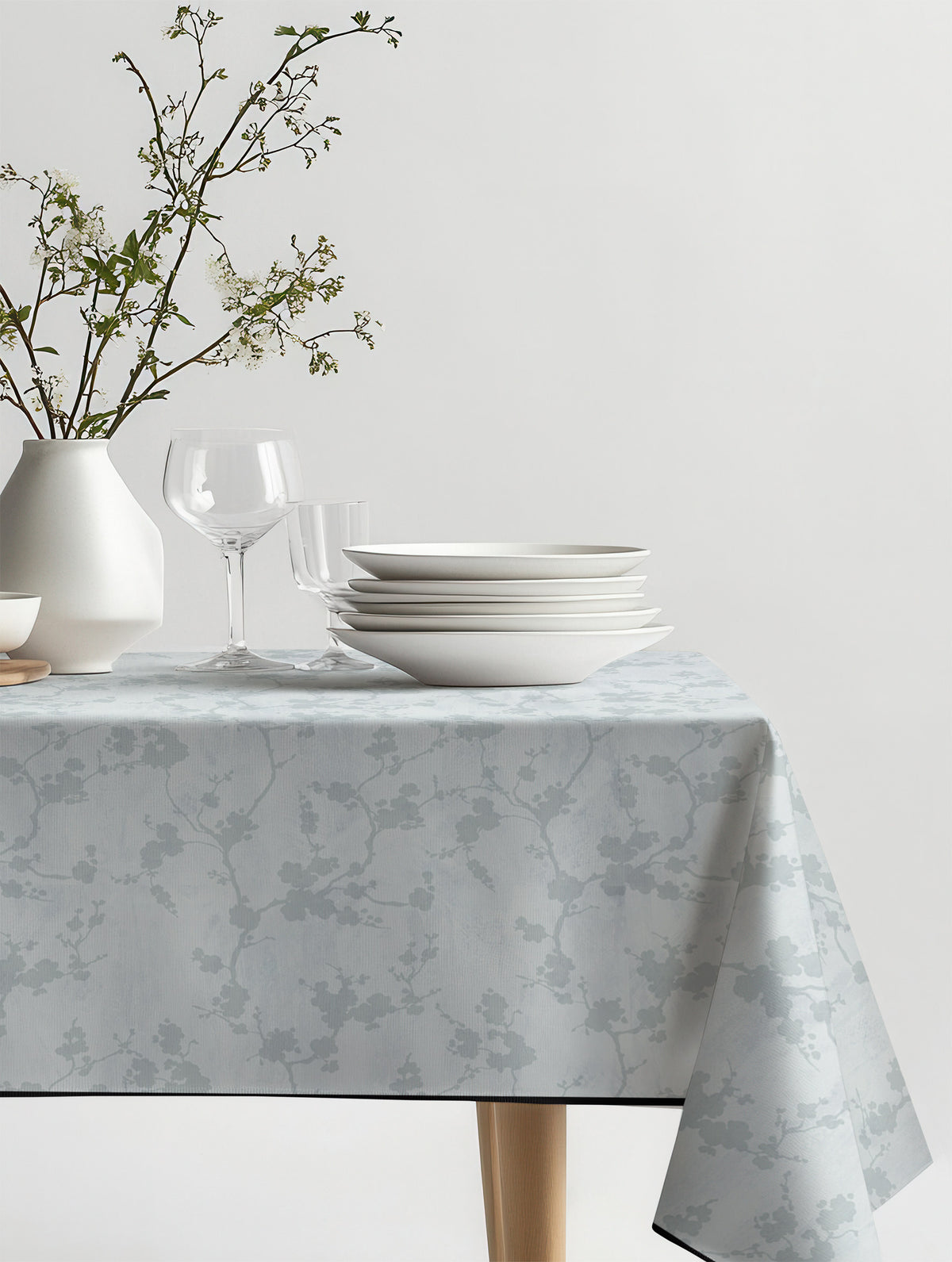 Mantel de hule Prim sobre una mesa