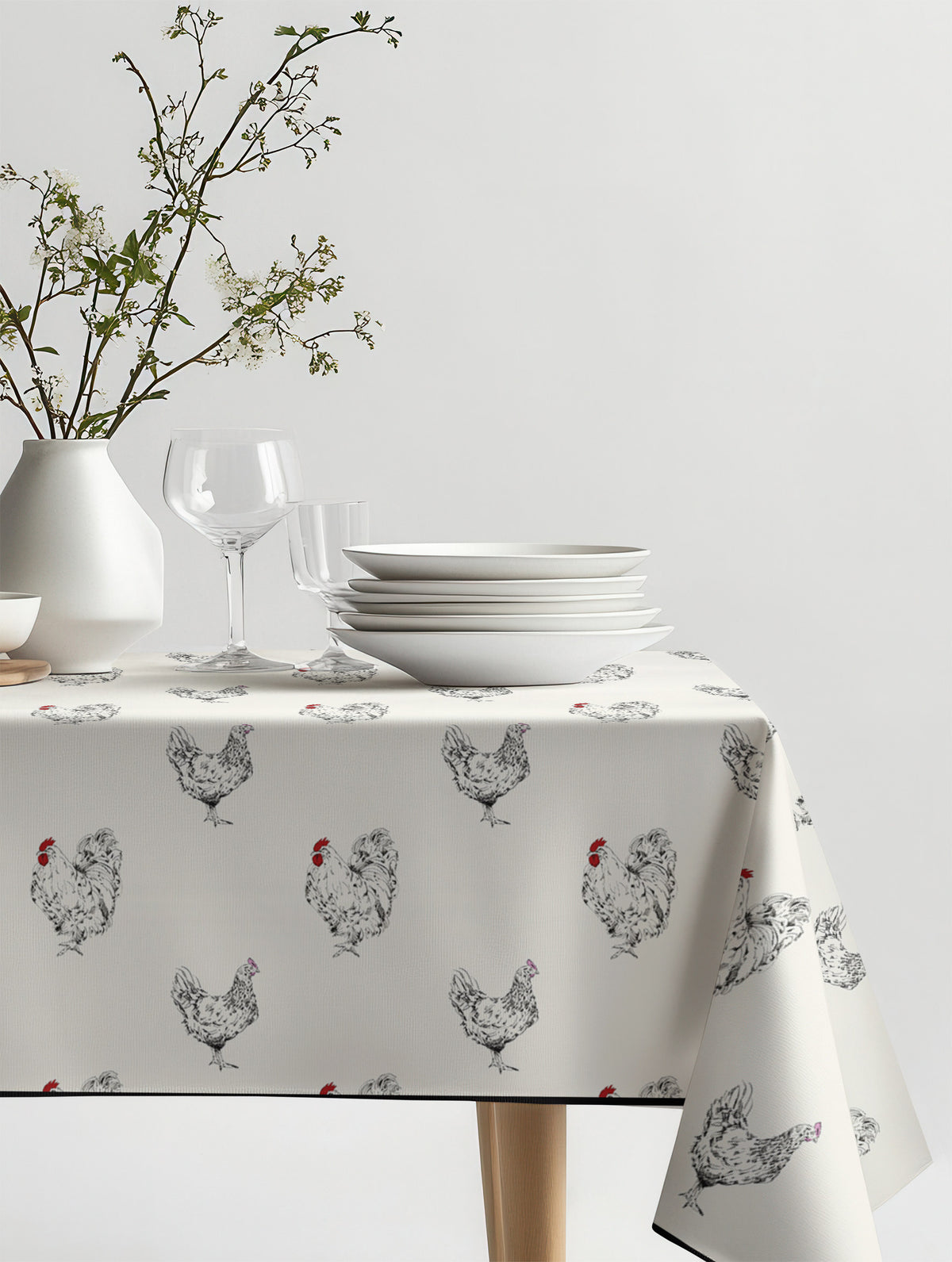 Mantel de hule gallos sobre una mesa