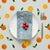 Mantel de Hule Orange, Leaves, Flowers and Slice