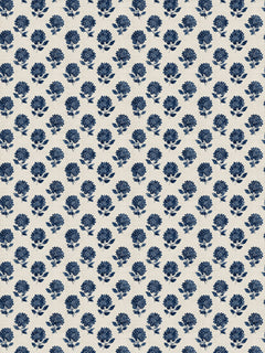Papel mural Anais, detalle del diseño: pequeñas flores redondas en azul marino sobre crema.