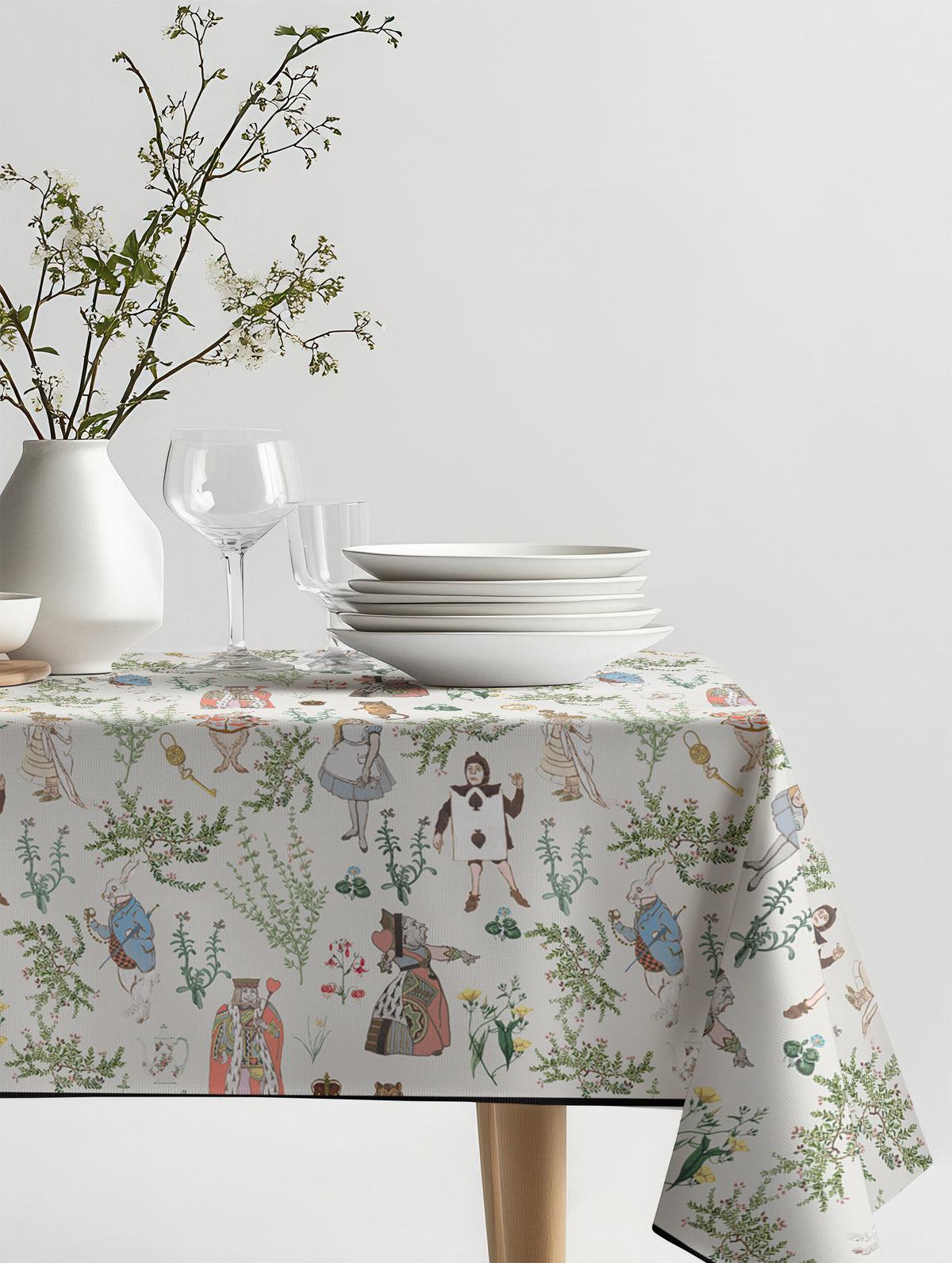 Mantel de hule Alicia sobre una mesa