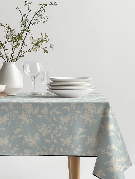 Mantel de hule Amélie sobre una mesa