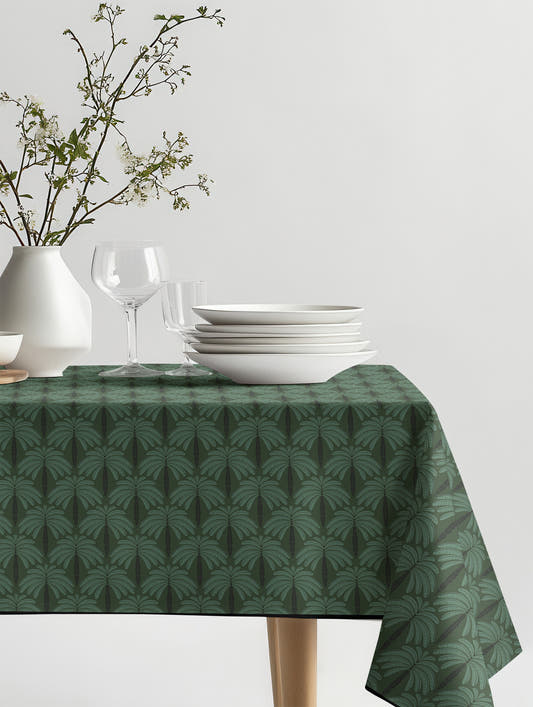 Mantel de hule Casa Palma Verde sobre una mesa