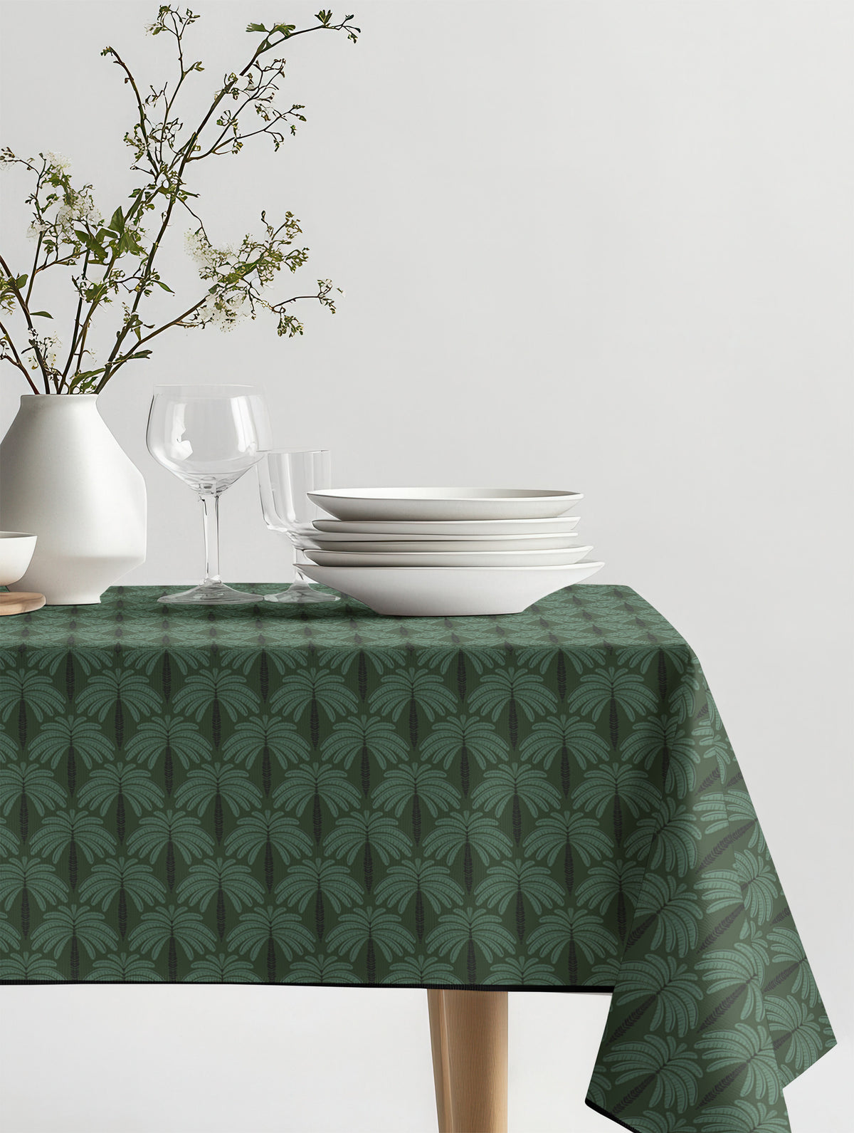 Mantel de hule Casa Palma Verde sobre una mesa