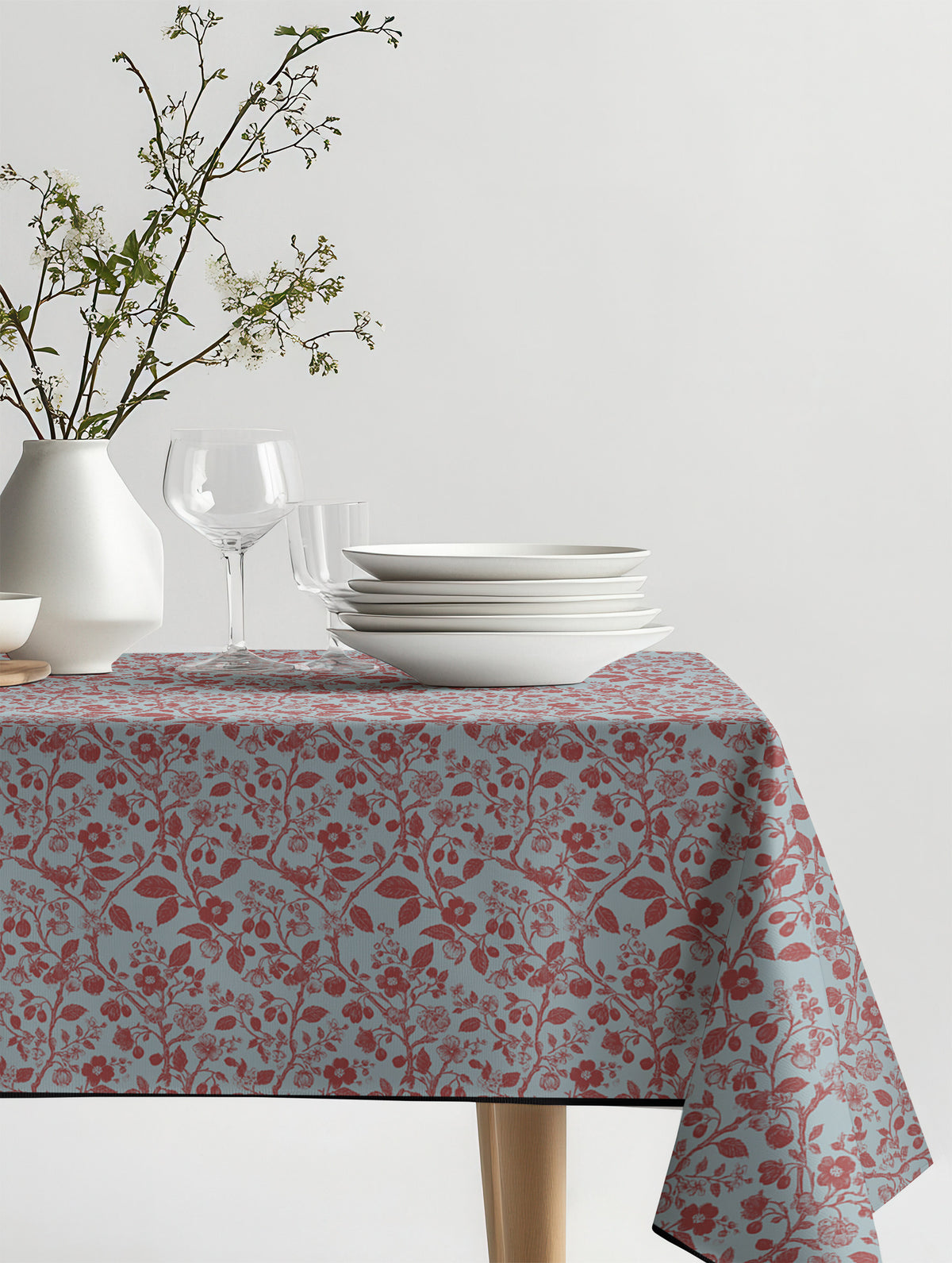 Mantel de hule Cloe sobre una mesa