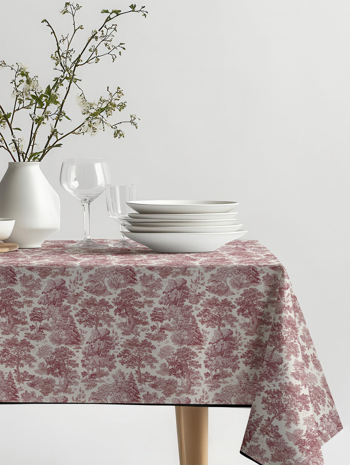 Mantel de hule Moulin Red sobre una mesa