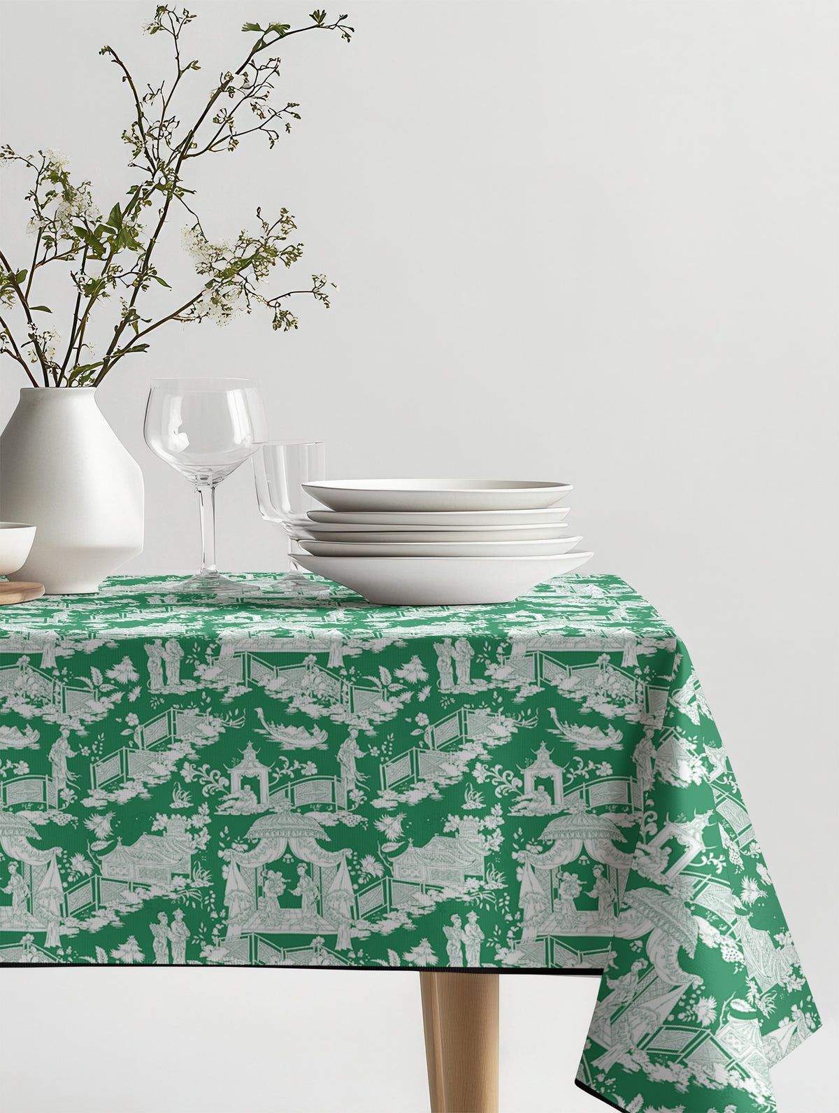 Mantel de hule Mulan Verde sobre una mesa