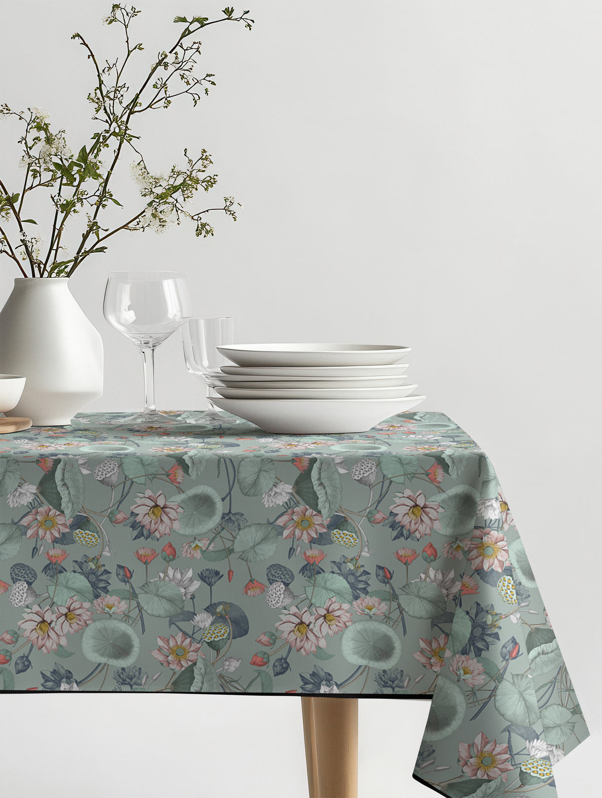 Mantel de hule Nelu Verde sobre una mesa