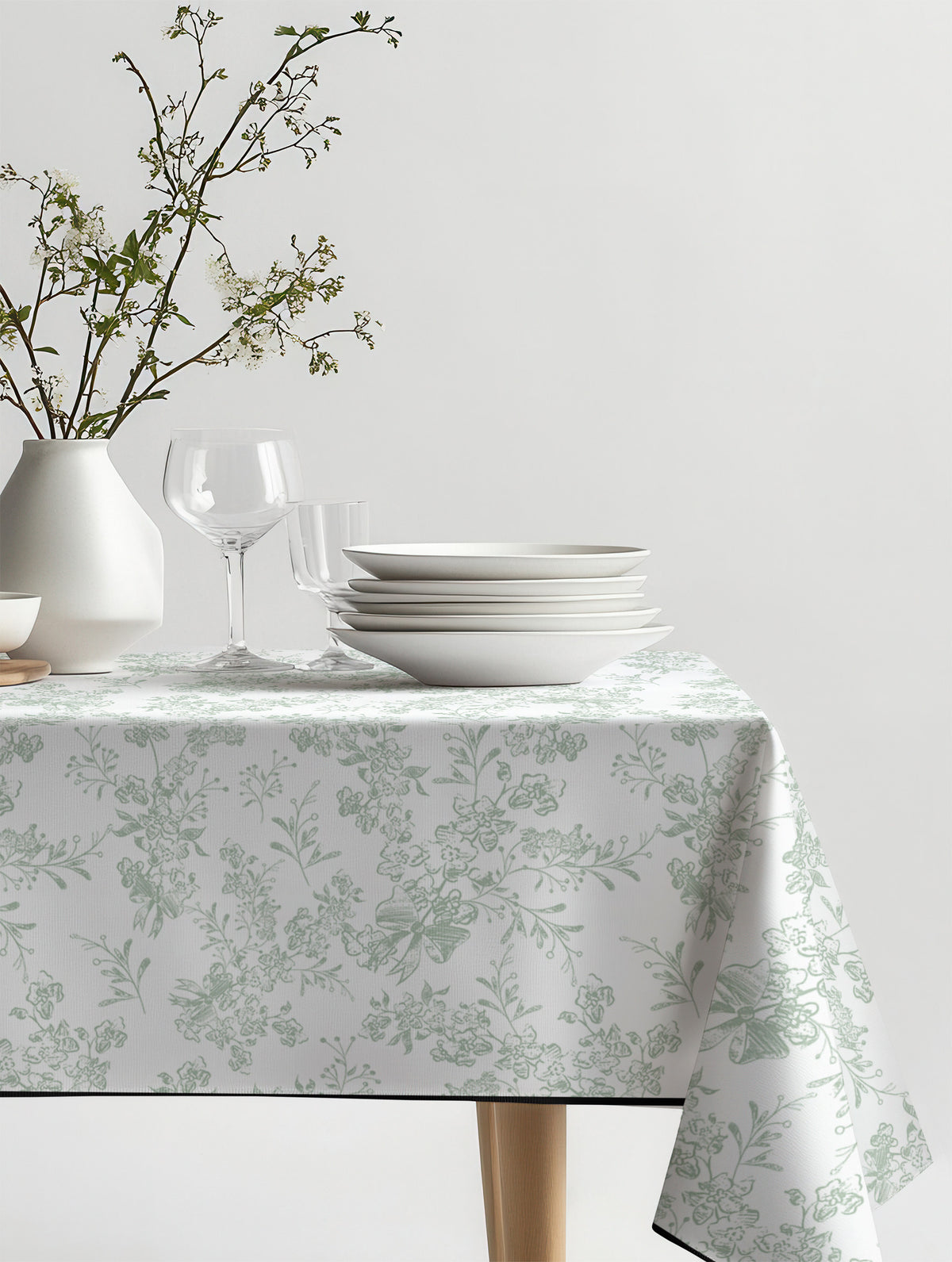Mantel de hule Noelia sobre una mesa