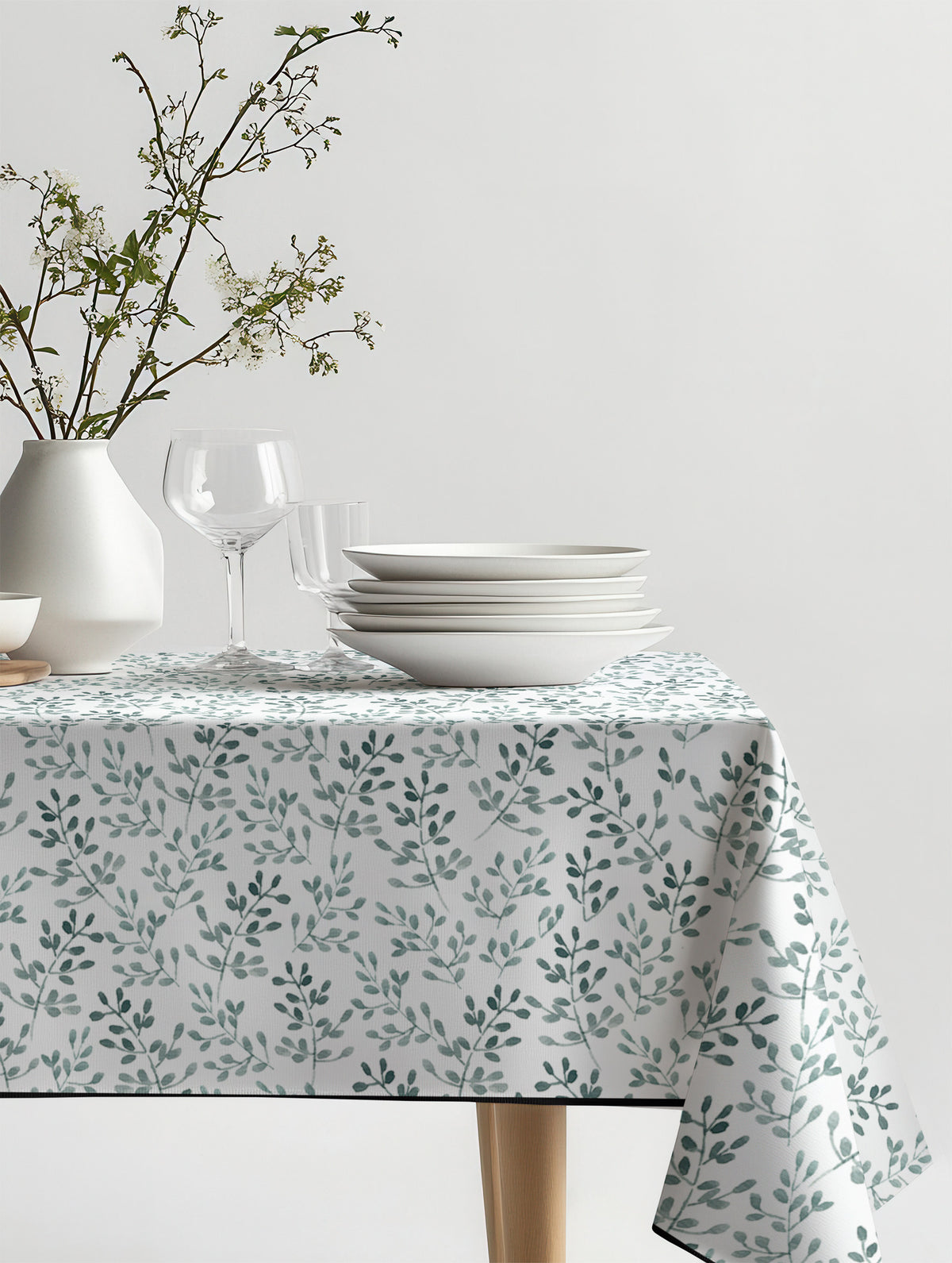 Mantel de hule Ramitas sobre una mesa