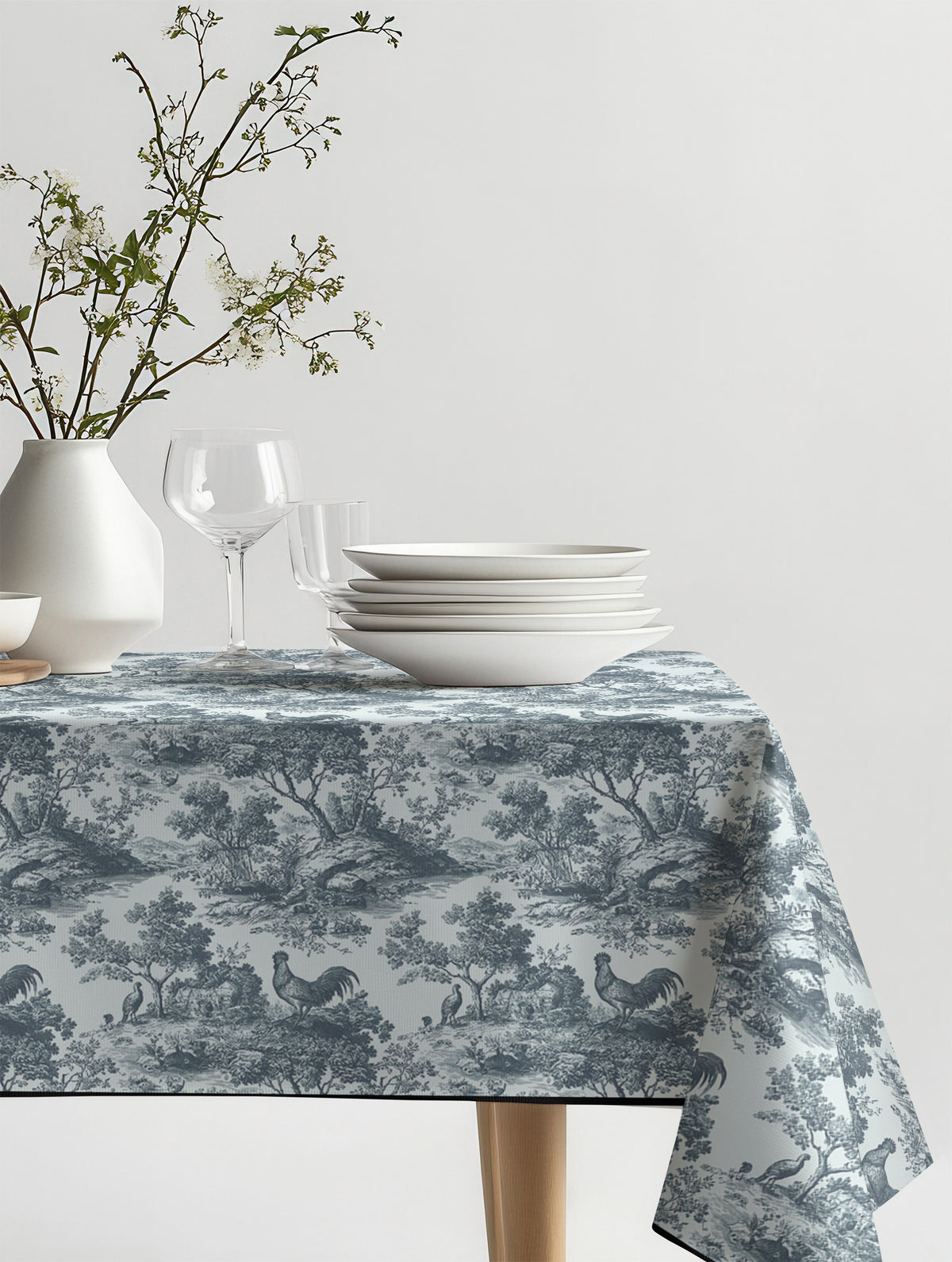 Mantel de hule Rooster sobre una mesa