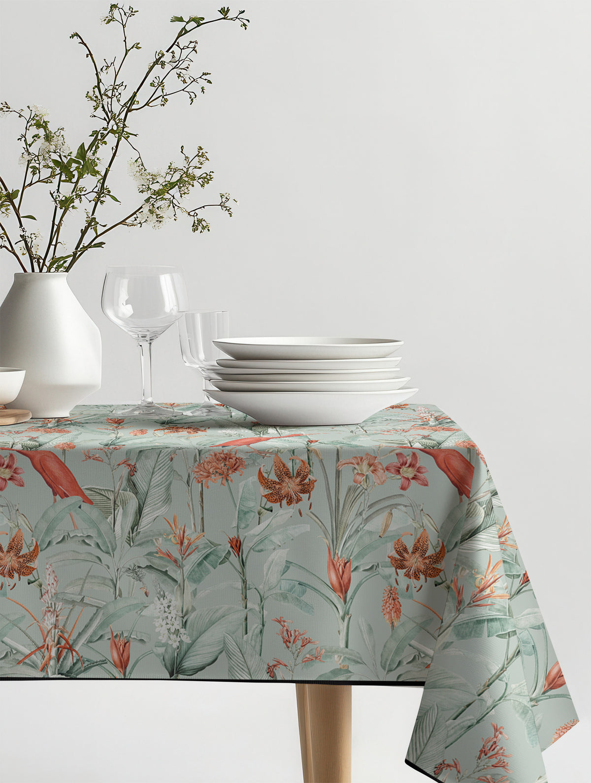 Mantel de hule Scarlett Ibisa sobre una mesa