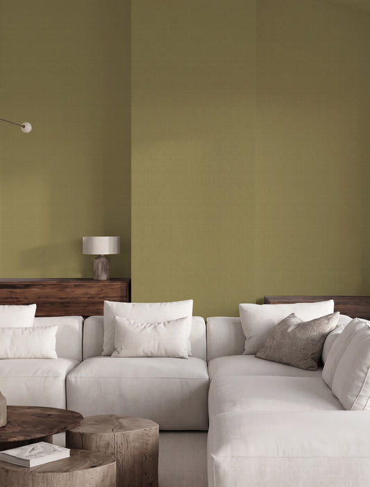 Papel mural Linen Pistacho, cálido diseño de liso con trama de lino en verde pistacho amostazado.